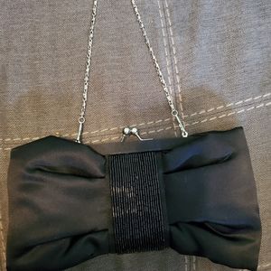 Bow style clutch purse